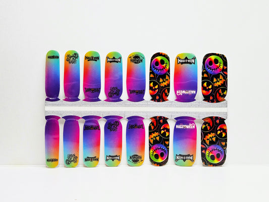 Colorful nail wraps with Halloween designs on a white background